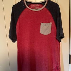 Men’s distressed pocket tee with block color sleeves